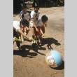 Campers moving a balloon with water guns (ddr-densho-336-1591)