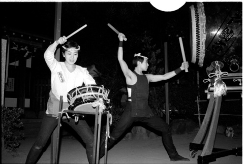 Kenny and Chizuko performing taiko (ddr-densho-1007-1211)
