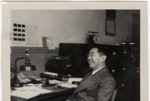 Man seated at desk (ddr-densho-426-892)