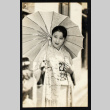 Woman with an umbrella (ddr-densho-404-111)