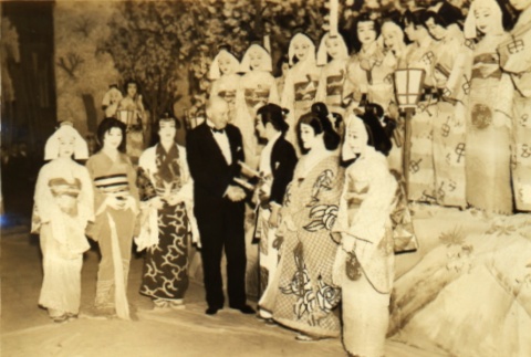 Henri de Baillet-Latour on a stage with actors in costume (ddr-njpa-4-739)