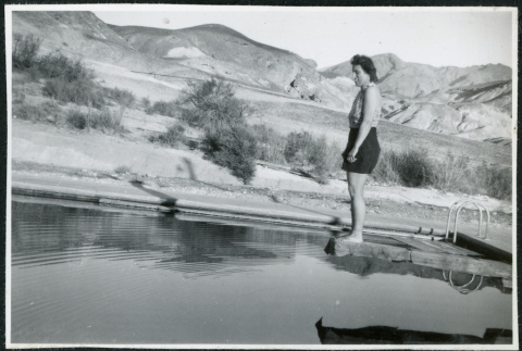 Photograph of L. Josephine Hawes standing on a diving board on New Year's Day in Death Valley (ddr-csujad-47-118)