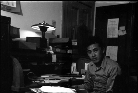 Man seated at desk (ddr-densho-426-950)