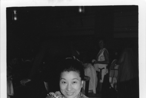 Nisei woman at dinner party (ddr-densho-16-11)