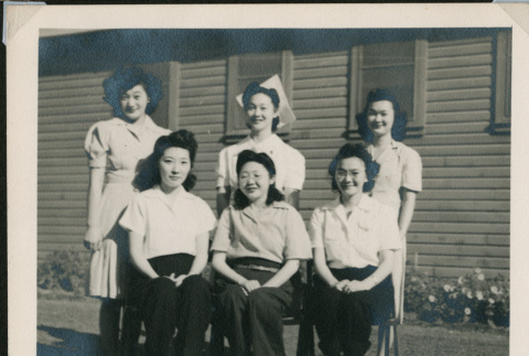 Six women posing outside barracks (ddr-densho-493-115)