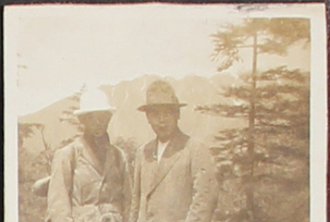 Two men posing during a hike (ddr-densho-278-52)