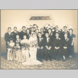 Group of people seated and standing for wedding (ddr-densho-332-48)