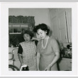 Yasuko and Irene Shigaki in kitchen (ddr-densho-456-10)