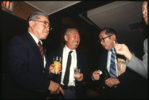 Four men with drinks (ddr-densho-1007-750)