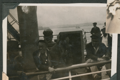 Men sitting on shipdeck (ddr-densho-540-89)