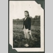 A woman standing in a strawberry field (ddr-densho-328-272)