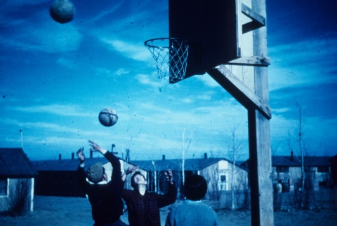Japanese Americans playing basketball (ddr-densho-160-71)