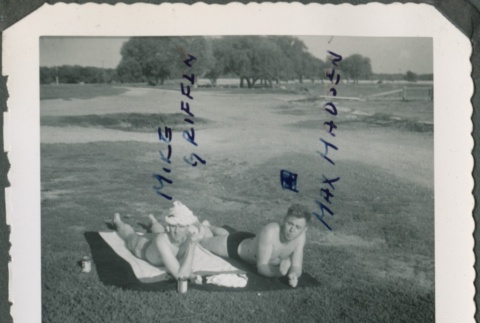 Two men laying on towels (ddr-densho-321-382)