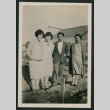 3 women and 1 man in a yard (ddr-densho-378-380)