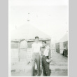 Two men in front of tents (ddr-densho-1007-602)