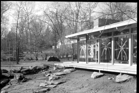 Front of house and deck with beginnings of landscaping (ddr-densho-377-1389)
