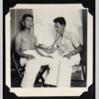 Man getting a medical examination (ddr-densho-542-746)