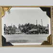 Two buildings among palm trees (ddr-densho-404-317)