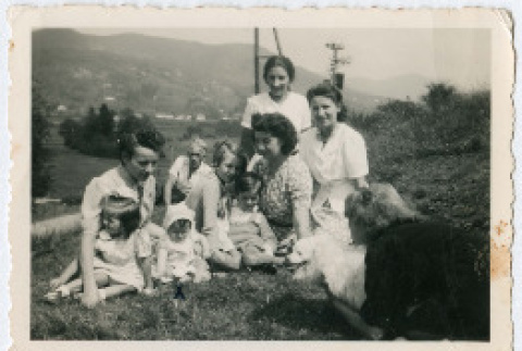 Women and children sitting in field (ddr-densho-368-152)