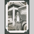 Man standing in front of a work truck (ddr-densho-463-196)