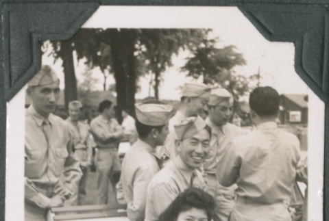 Woman sitting in chair with Joe Iwataki behind her (ddr-ajah-2-526)