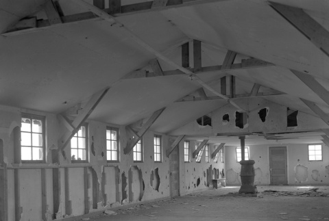 Interior of a barracks being renovated or demolished (ddr-fom-1-656)