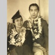 Yeichi and Lisan Kay Nimura wearing leis (ddr-njpa-4-1403)
