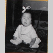 Baby with bow in her hair (ddr-densho-522-30)