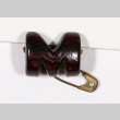 Carved letter M pin (ddr-densho-475-163)