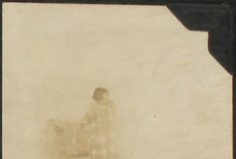 Woman with plaid coast (ddr-densho-423-498)