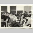 Women's auxiliary group making flower centerpieces (ddr-jamsj-1-409)