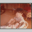 Danny Sakura with baby Peter Todd (ddr-densho-523-479)