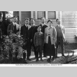 Takuritsu Morita and friends standing outside Morita's house (ddr-ajah-6-637)