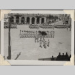 Rows of men in parade with color guard, seen from above (ddr-densho-466-760)