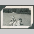 Two children playing in a field (ddr-densho-321-934)