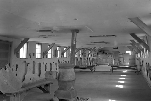 Interior of a barracks being renovated or demolished (ddr-fom-1-661)