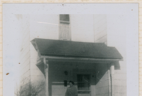 Betty and Peter on the front porch (ddr-densho-462-211)