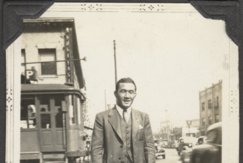 Man standing in street (ddr-densho-326-502)