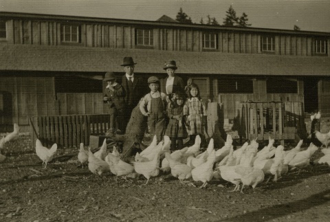 Family visiting a chicken farm (ddr-densho-182-102)
