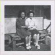 Two women sitting on a bench (ddr-manz-10-141)