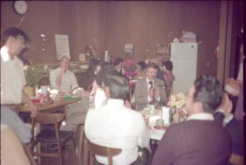Group seated at tables (ddr-densho-426-611)