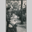 Woman holding baby (ddr-densho-523-176)