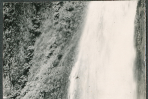 Man and baby in front of Multnomah Falls (ddr-densho-523-129)