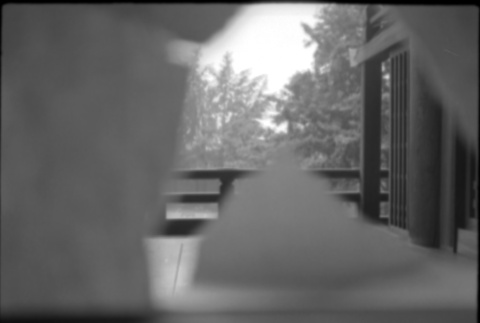 View through torn paper screen (ddr-densho-426-2334)