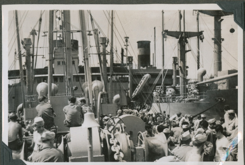 Soldiers transferred to a new ship for the ride home (ddr-densho-201-834)