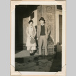 Photo of man and woman outside building (ddr-densho-341-69)