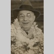 Man wearing leis (ddr-njpa-2-852)