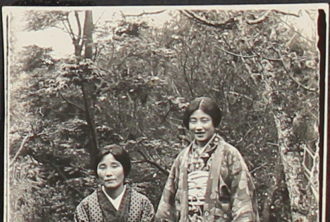 Two women posing outside in kimono (ddr-densho-278-78)