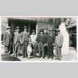 Group gathering outside store (ddr-densho-480-86)