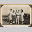 The Kikawas beside a garden (ddr-densho-542-514)